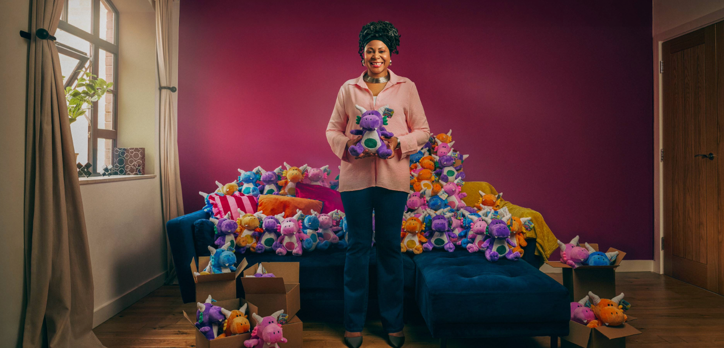 Bella Zanj holding her cuddly dragon – Zuki. Bella Zanj holding her cuddly dragon – Zuki.